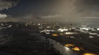 Ambrosia, official still: The refinery town at night